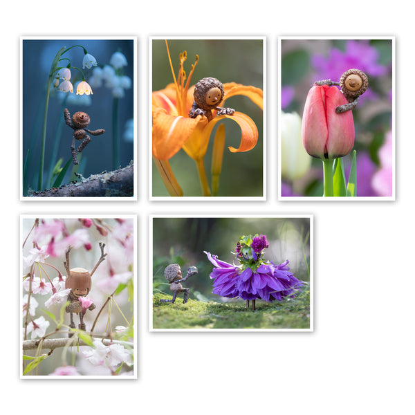 Five photos on a white background. First: a Becorn jumping off a log towards a cluster of snowbell flowers. One of the flowers is glowing a warm white color. Second: a becorn sitting in an orange day lily. Third: a Becorn smiling and holding onto a pale red tulip. Fourth: a Becorn standing on a branch of a weeping cherry tree, holding one of the flowers and looking at it happily. Fifth: a Becorn on one knee offering a globe of water to a flower person whose body is a purple dahlia.