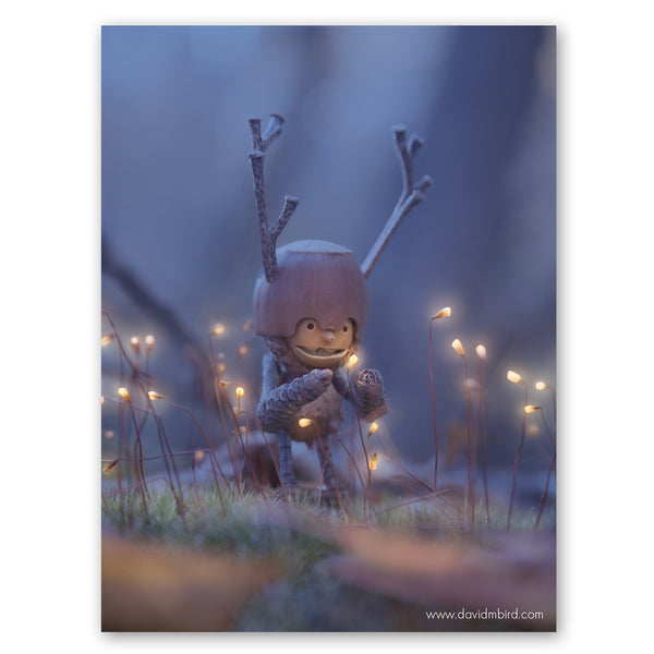 A Becorn with a helmet and antlers gazes in wonder at a tiny glowing flower that is shaped like a cone. He is surrounded by more of the same glowing flowers. The background is a misty blue.